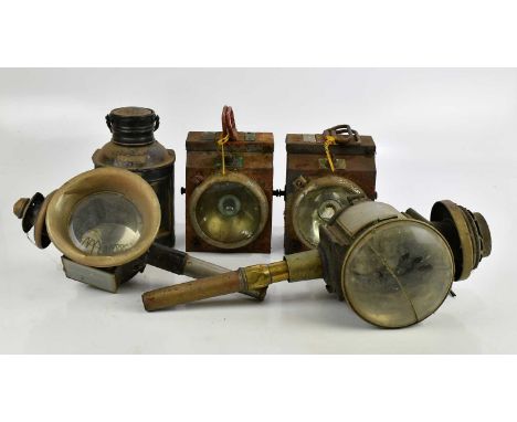 Two carriage lamps together with a small ship's lamp and two further industrial lamps (5).Condition Report: The item or items