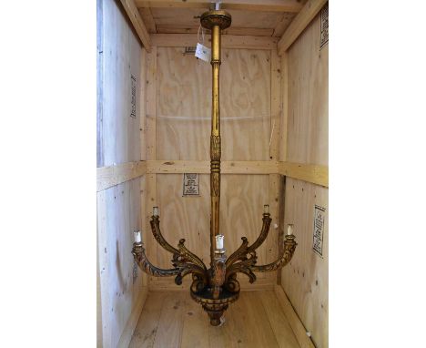 An Italian style carved gilt wood six branch ceiling light, height 157cm.Condition Report: The item or items in this lot are 