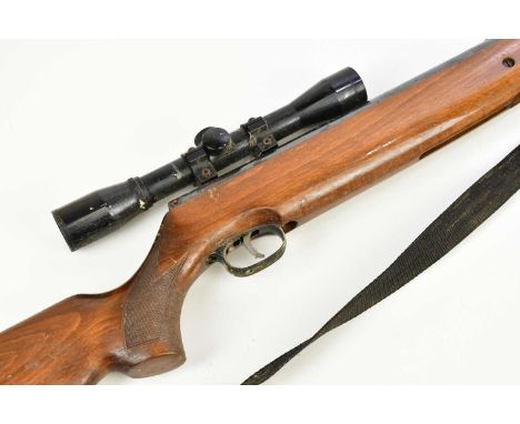 WEIHRAUCH; a .22 'HW80' break barrel air rifle, with 15" silenced barrel, chequered walnut stock and Apollo 4x32 telescopic s