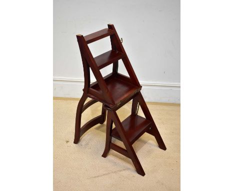 A set of modern mahogany metamorphic library chair/steps.Condition Report: Light surface wear but good overall condition.