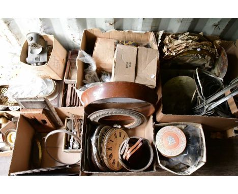 An extensive collection of clock parts, movements, accessories including two longcase clock cases, various dials, etc (qty).