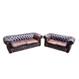 DISTINCTIVE CHESTERFIELDS; two brown leather Chesterfield sofas, length of largest 202cm (2).