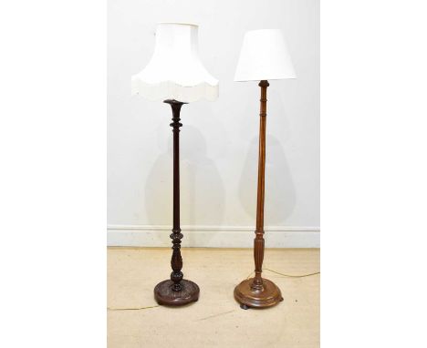 An oak standard lamp, with fluted detailing, height 157cm, and a further standard lamp (2)Condition Report: The item or items