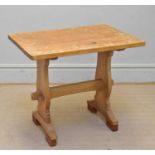 COLIN 'BEAVERMAN' ALMACK; an adzed oak trestle table, with later applied blocks to feet, length