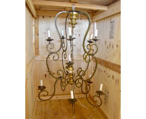A decorative Italian style eleven branch ceiling light with scrolling arms, height 123cm.Condition Report: The item or items 