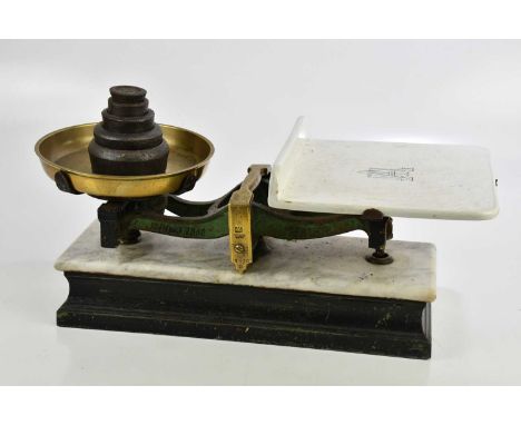 PARNALL &amp; SONS; a set of balance scales with ceramic and brass plate on marble plinth terminating on ebonised base, lengt