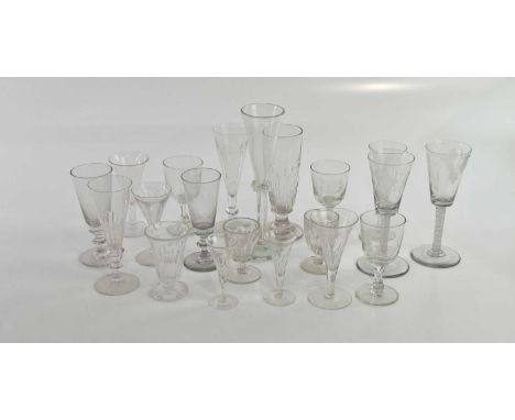 A collection of eighteen various 19th century and later drinking glasses, including two spiral stem examples with vine decora