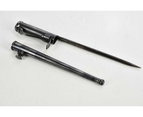 A WWII sten gun bayonet with scabbard. 