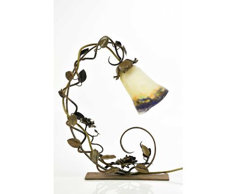 An Arts and Crafts cast metal desk lamp with trailing floral detail and Muller Frères style shade, height 42cm.   Condition R