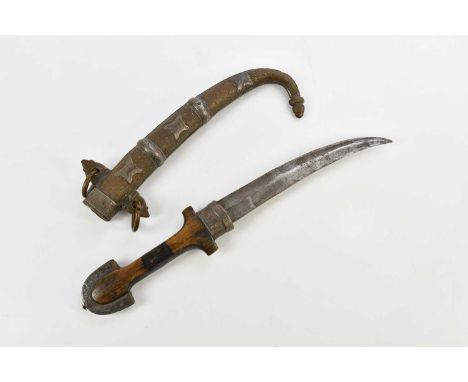 An Eastern Jambiya with wooden handle, the scabbard with copper and white metal applied detail, length 40cm.