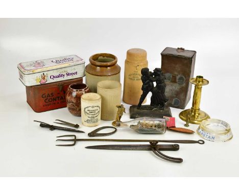 A collectors' lot including ashtray, stoneware jar, brass candlestick, ship in bottle, adverising tins, etc.