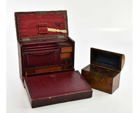 A Victorian brass bound dome topped walnut tea caddy and a leather bound deskstand (2).