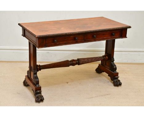 A Regency rosewood hall table with bobbin effect moulding above the two drawers and turned fluted column terminating on four 
