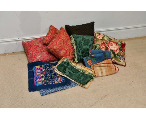 Six vintage cushions including three cotton red Paisley Victorian cushions made from Welsh quilt, a Vaughan needlepoint cushi