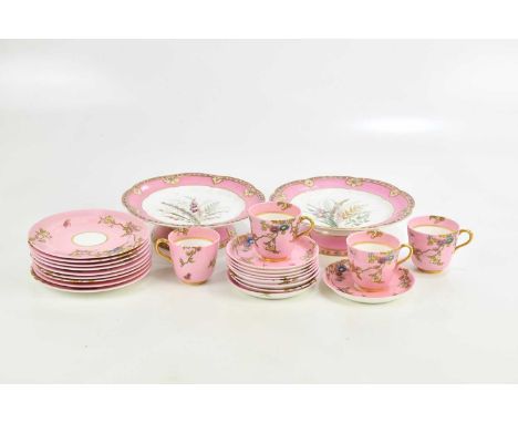 T C BROWN-WESTHEAD; a part tea service with floral decoration on a salmon pink ground and two Worcester hand painted comports