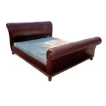 A good quality brown leather super king size bed, with base. Condition Report: Scuffs and