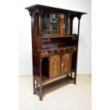 A Scottish Arts and Crafts inlaid mahogany display cabinet, with moulded cornice above a central