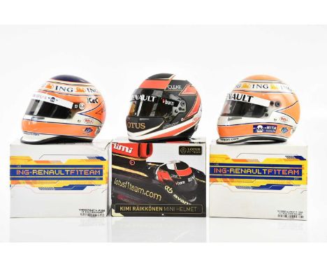 A Lotus F1 team Kimi Räikkönen mini helmet and two further ING Renault examples, one example bearing signature of Nelson Piqu