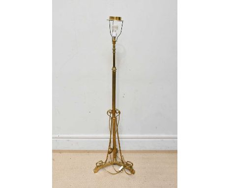 An early 20th century brass telescopic standard lamp, height 160cm.Condition Report: The item or items in this lot are sold a