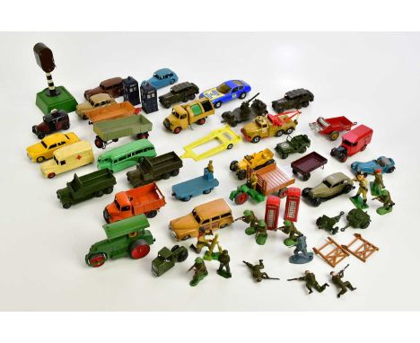 A collection of predominantly Dinky toys, playworn vehicles and assorted cast metal soldiers.