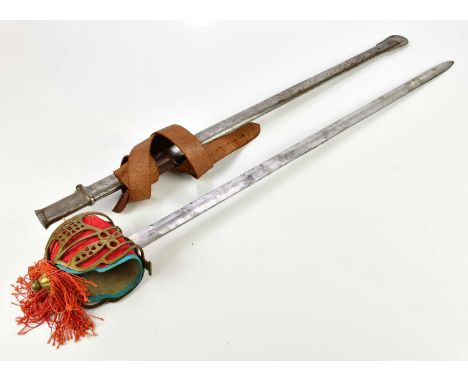 A late 19th/early 20th century Scottish broad sword with possibly associated scabbard.
