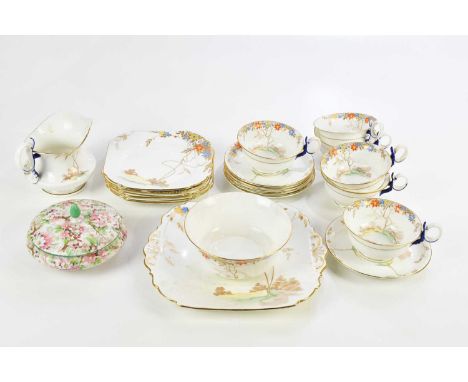 SHELLEY; a Queen Anne shaped part tea service with floral decoration, comprising six side plates, one serving plate, six cups