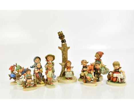 HUMMEL; a collection of twelve figures, one af, and a lamp base, largest 25cm (13).Condition Report: The item or items in thi