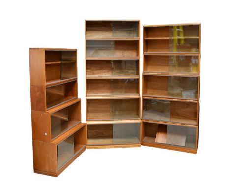 SIMPLEX; three light mahogany sectional bookcases comprising two with five sections, height 210cm, and one with four sections