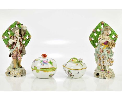 A pair of early 20th century Samson porcelain figures in the manner of Derby, representing a male holding dead game and a mai