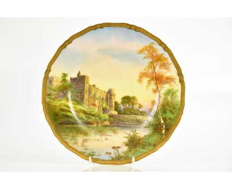 ROYAL WORCESTER; a hand painted cabinet plate, 'Warwick Castle', diameter 27cm.   Condition Report: Light surface wear but go