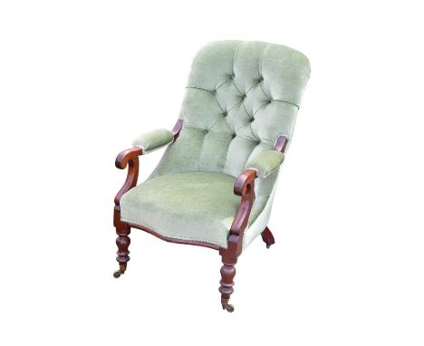 A 19th century mahogany framed elbow chair, upholstered in a green button back material. 