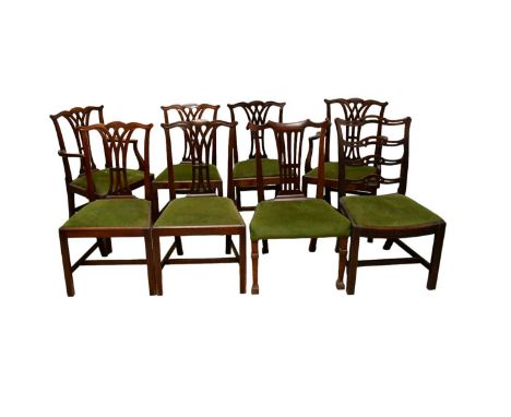 A set of six Chippendale style dining chairs with green upholstered drop in seats, together with two carvers.