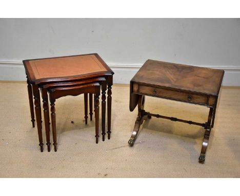 A reproduction nest of three occasional tables and a sofa coffee table (2).