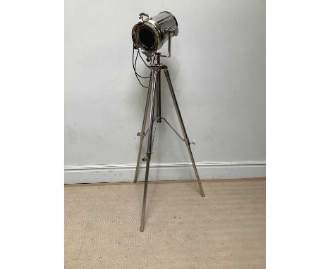 A modern chrome tripod spotlight, height 168cm.Condition Report: The item or items in this lot are sold as decorative works o