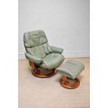 STRESSLESS; a leather armchair with stool.