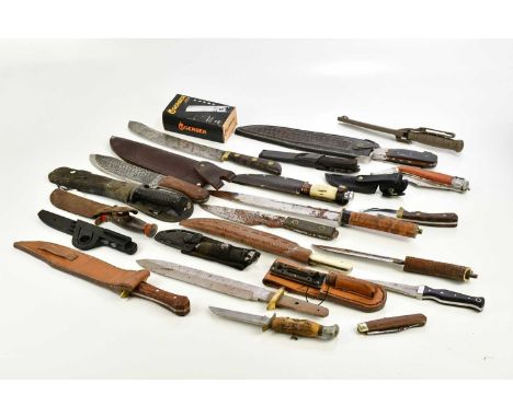 A collection of various knives including Bowie knives, tactical knives, hunting knives, etc (qty).