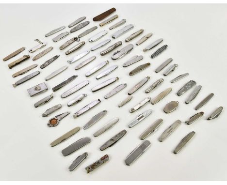 A collection of stainless steel handled penknives with engine turned decoration examples.