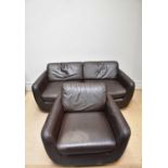 A modern brown leather two seater sofa and armchair (2).