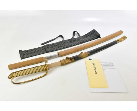 A good mid to late 17th century Japanese Katana by Teruhiro from Aki province, length of blade 66cm, fitted in wooden mount, 