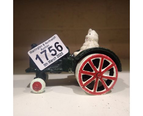 Cast iron Michelin Man on a tractor. UK P&amp;P Group 1 (£16+VAT for the first lot and £2+VAT for subsequent lots) 