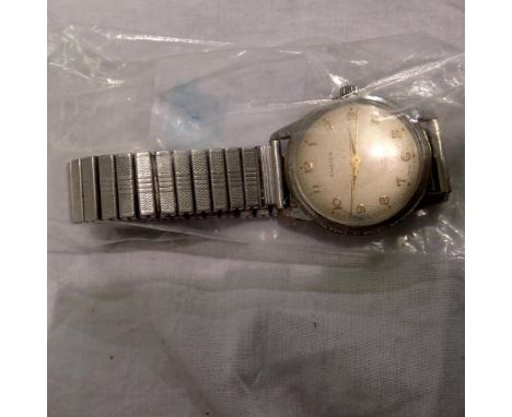 ENSIGN: gents manual wind wristwatch, chromium plated case with champagne dial, working at lotting, on steel expanding bracel