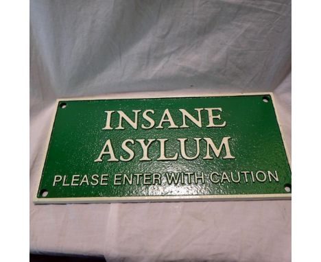 Cast iron Insane Asylum sign, W: 30 cm. UK P&amp;P Group 2 (£20+VAT for the first lot and £4+VAT for subsequent lots)