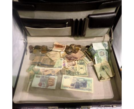Briefcase containing world notes and coins. Not available for in-house P&amp;P 