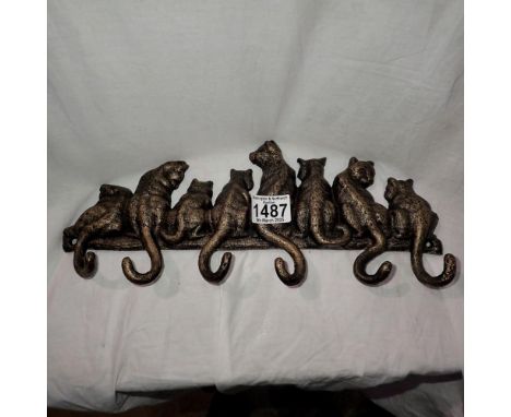 Cast iron cat tail coat hanger, L: 36 cm. UK P&amp;P Group 2 (£20+VAT for the first lot and £4+VAT for subsequent lots)