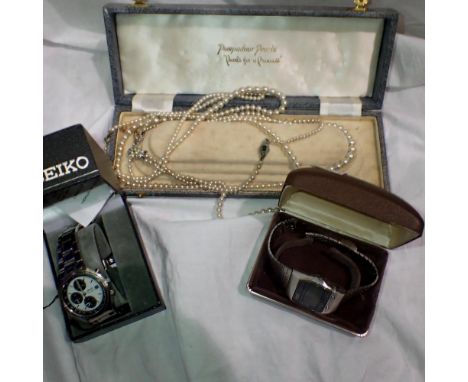 Two boxed Seiko wristwatches, and two pearl necklaces. UK P&amp;P Group 1 (£16+VAT for the first lot and £2+VAT for subsequen