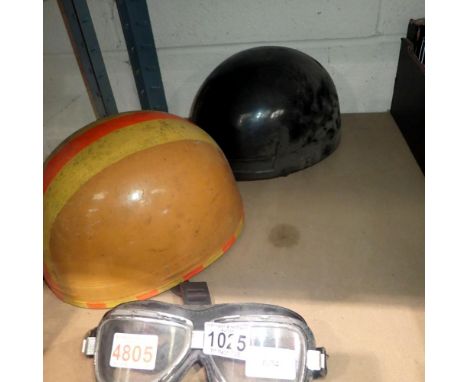 Two vintage motorcycle helmets and a pair of goggles. UK P&amp;P Group 3 (£30+VAT for the first lot and £8+VAT for subsequent