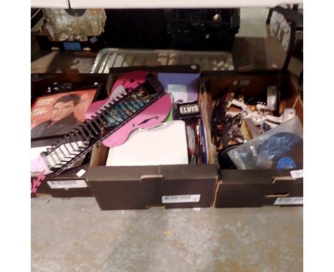 Large collection of Elvis memorabilia over three boxes to include Hound Dog on 78. Not available for in-house P&amp;P 