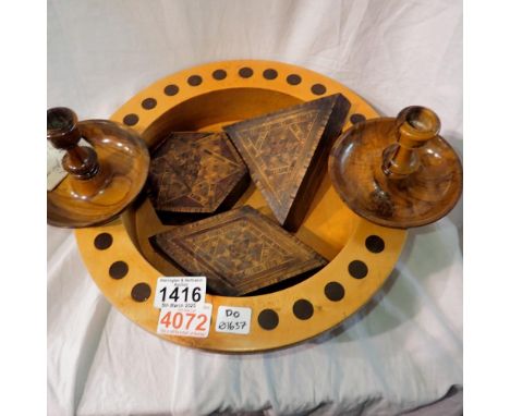 Mixed treen to include a bowl, three trinket boxes and a pair of oiled olive wood candle sticks. Not available for in-house P