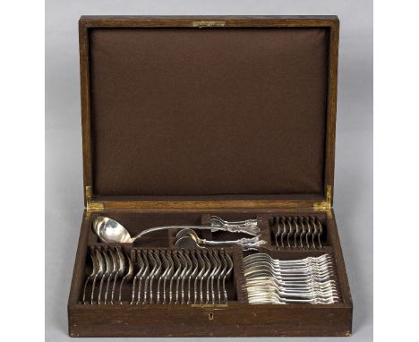 An oak cased canteen of Victorian silver cutlery, predominantly hallmarked for 1852, maker's mark of John WirgmanEach piece e