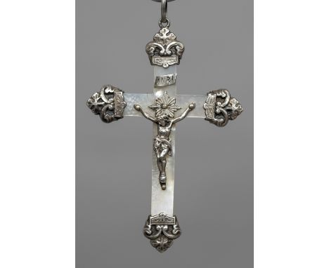 A late 19th century French unmarked silver mounted mother-of-pearl crucifix pendantTypically formed, the reverse with an insc